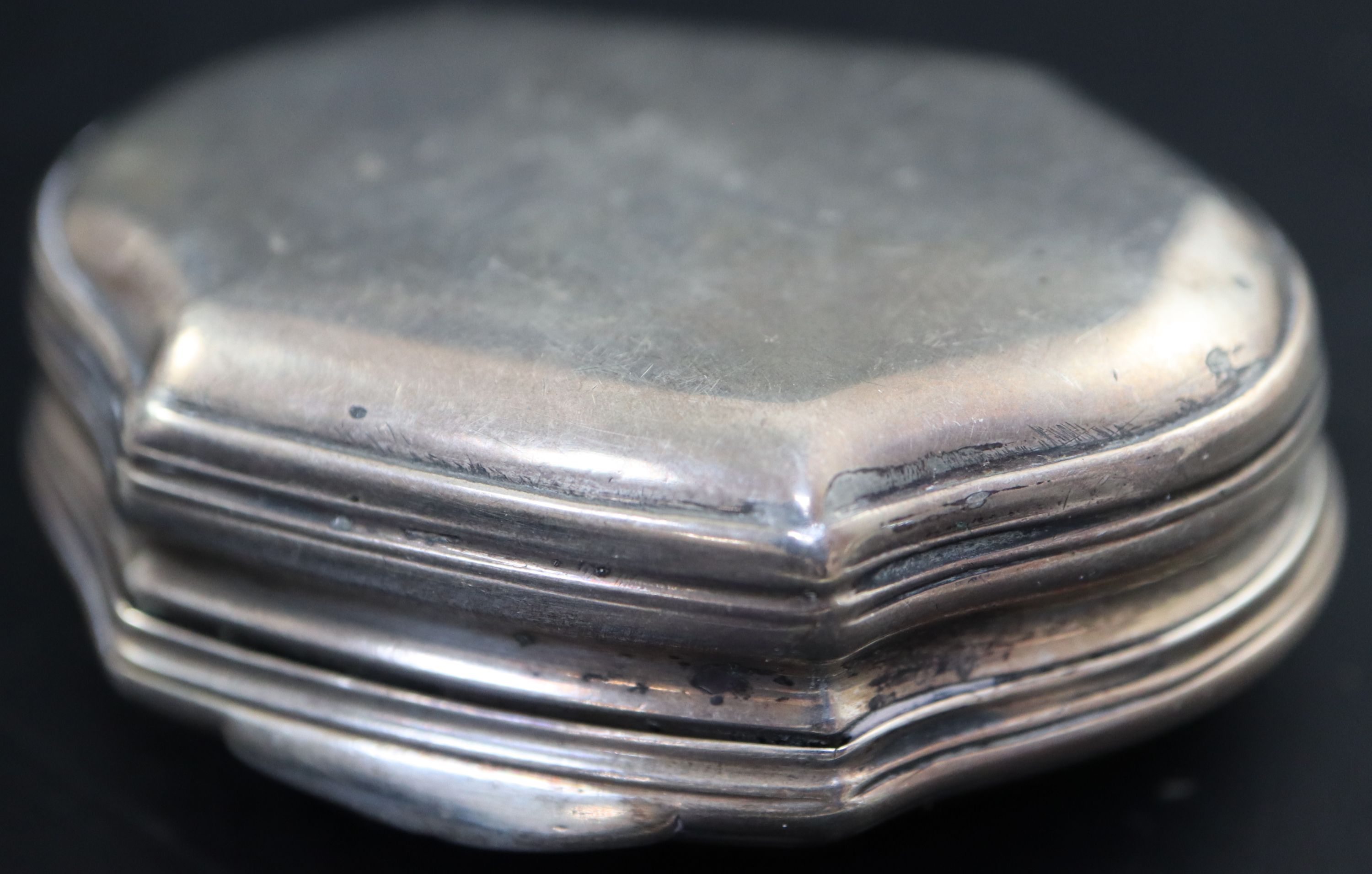 A 19th century Continental engraved white metal snuff box, 57mm, gross 31 grams.